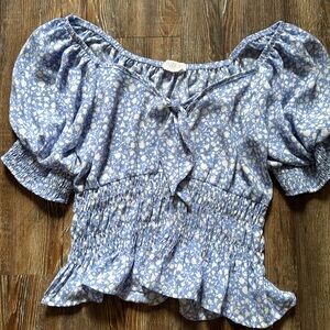 Blue and white top with tie feature